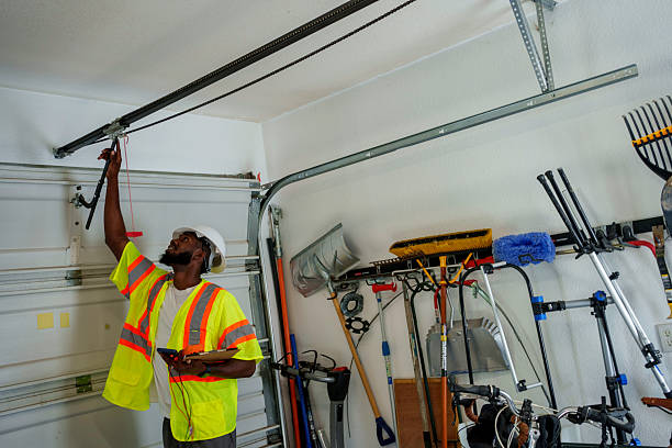 Professional Garage Door Panel Replacement technician working in Bay City, OR